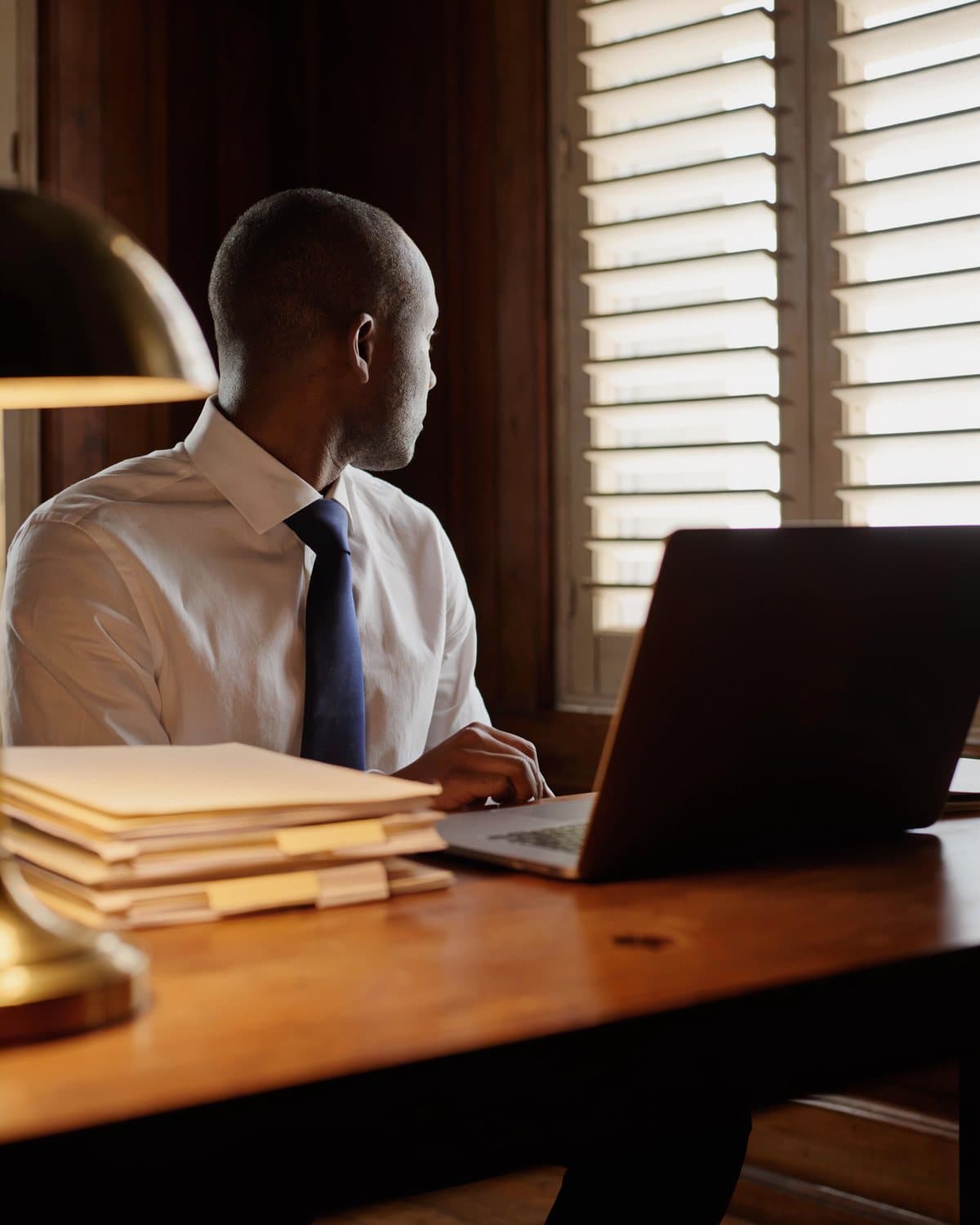 A compliance officer at work in an office in the Caribbean.